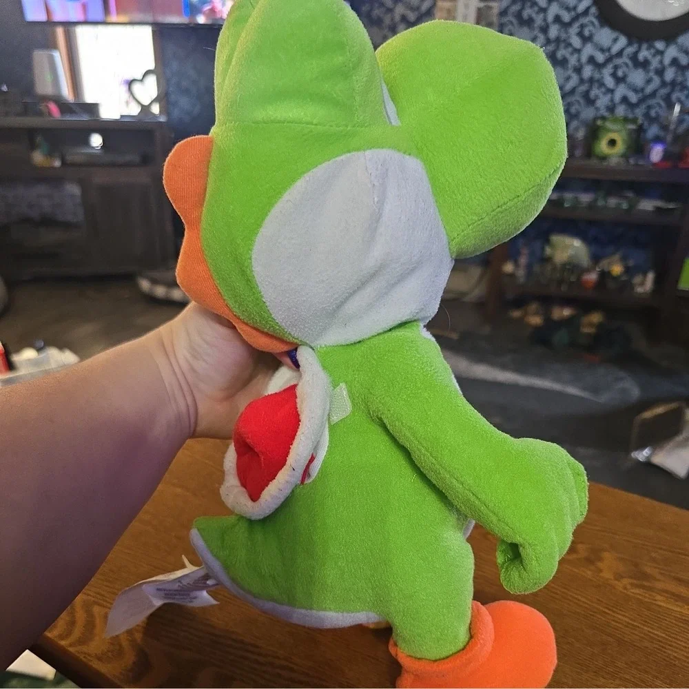youshi mario brothers plush with pouch under his shell collectiors‎